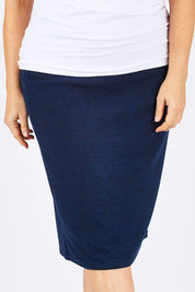 Model Ljubenka wearing size 18 of the Belle Textured Pencil Skirt in colour Navy (Blue), from the front, cropped image