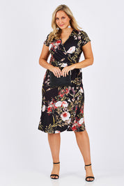 Model Jess wearing size 12 of the Belle Orange Blossom Wrap Dress in colour BlosPrint, from the front, showing the whole outfit