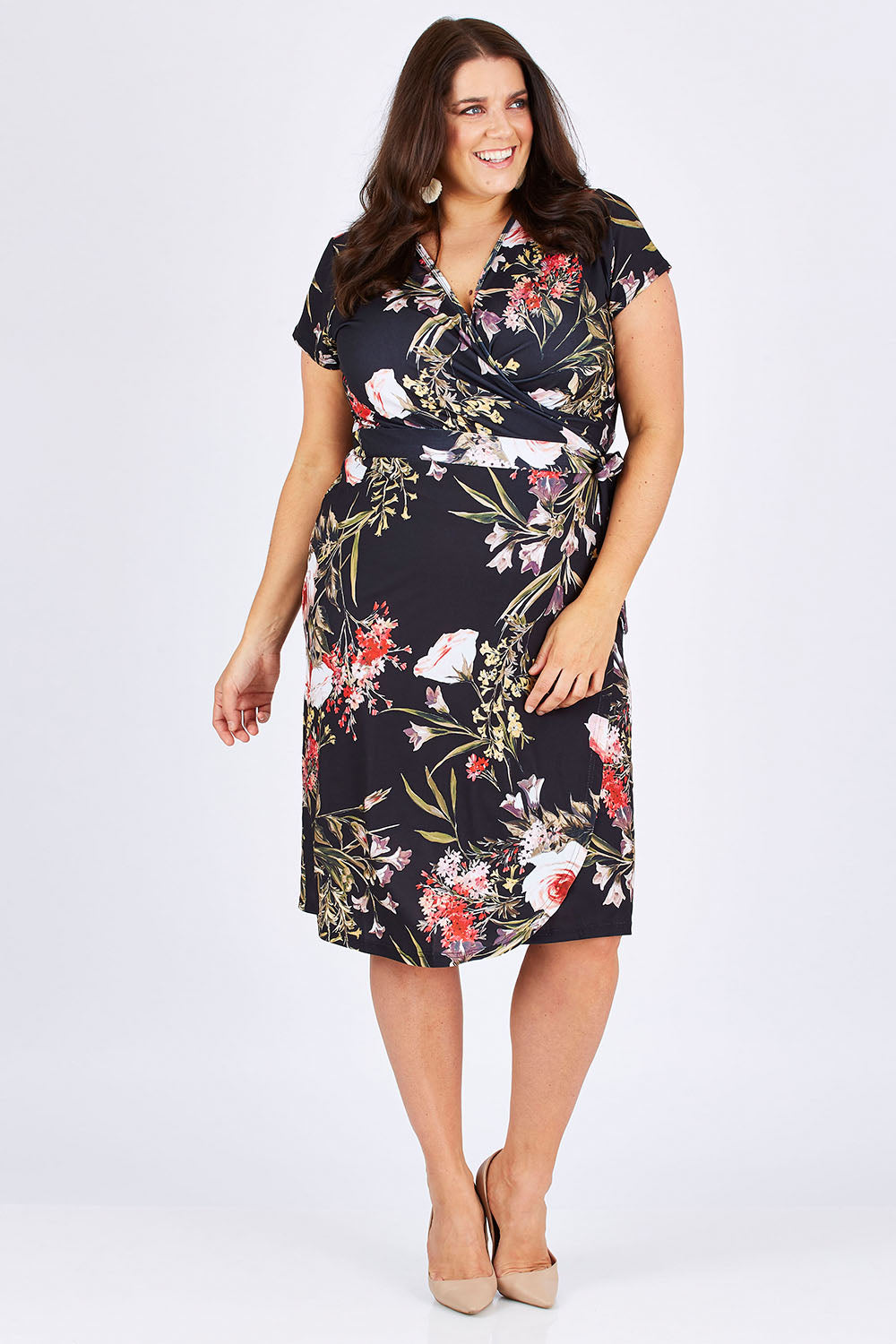 Model Mae wearing size 18 of the Belle Orange Blossom Wrap Dress in colour BlosPrint, from the front, showing the whole outfit