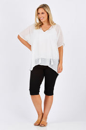 Model Jess wearing size 12 of the Belle Knee Short in colour Black (Black), from the front, showing the whole outfit