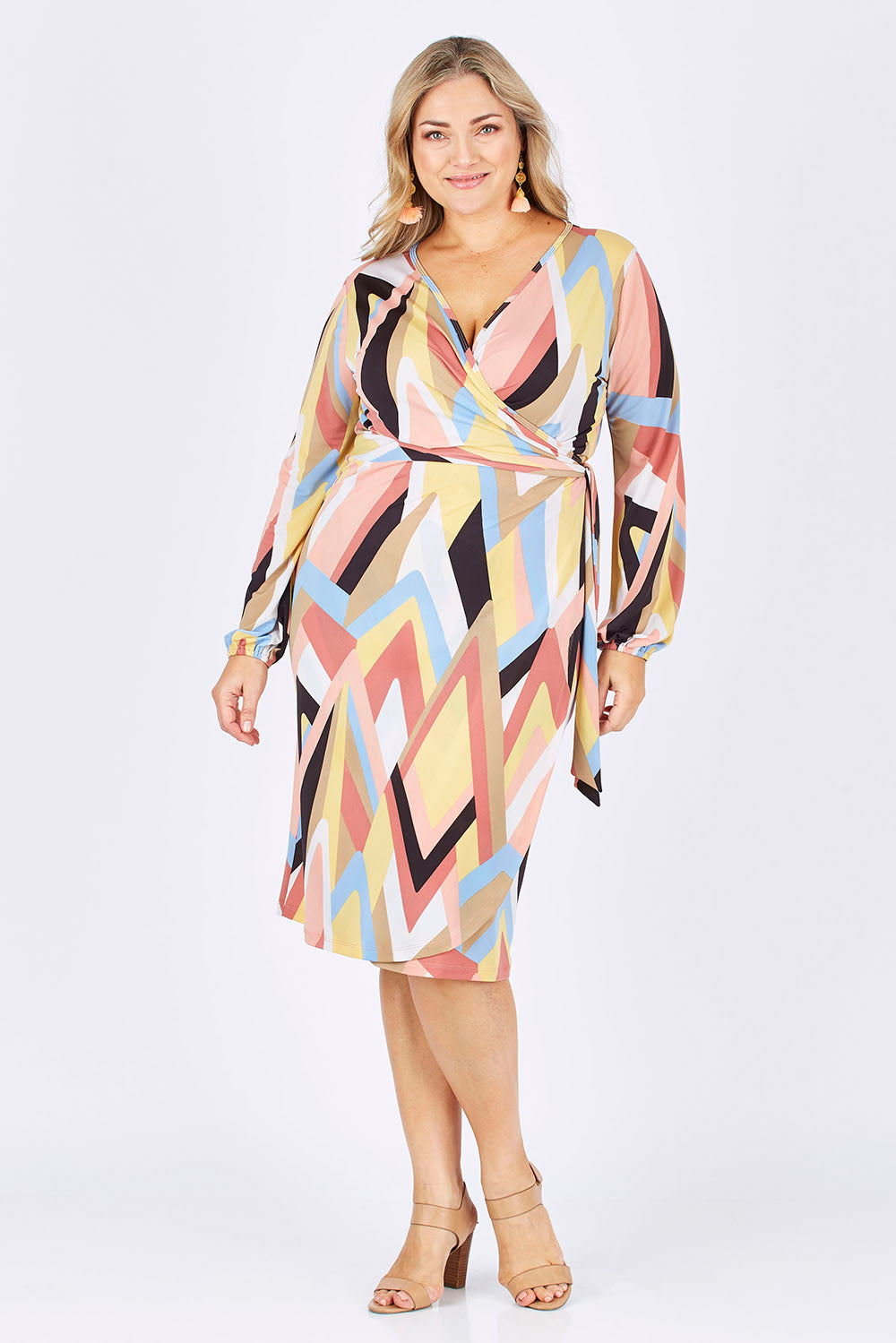 Model Ljubenka wearing size 16 of the Belle Pastel Geometric Wrap Dress in colour Pastel, from the front, showing the whole outfit
