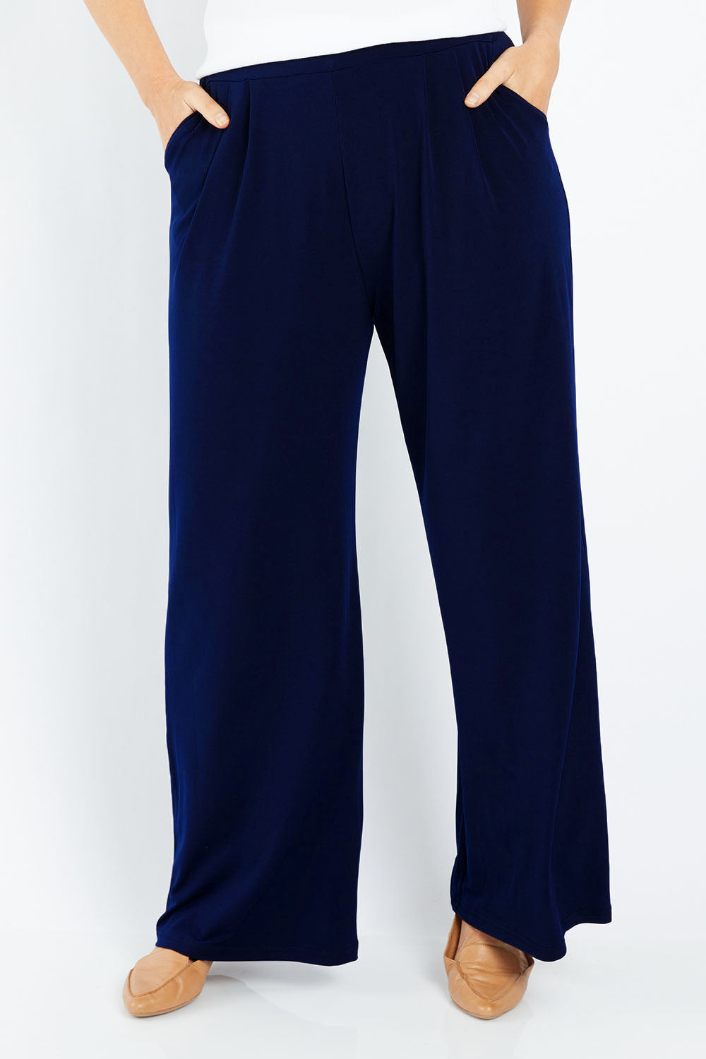 Model Laura wearing size 12 of the Belle Wide Leg Pant in colour Navy (Blue), from the front, cropped image