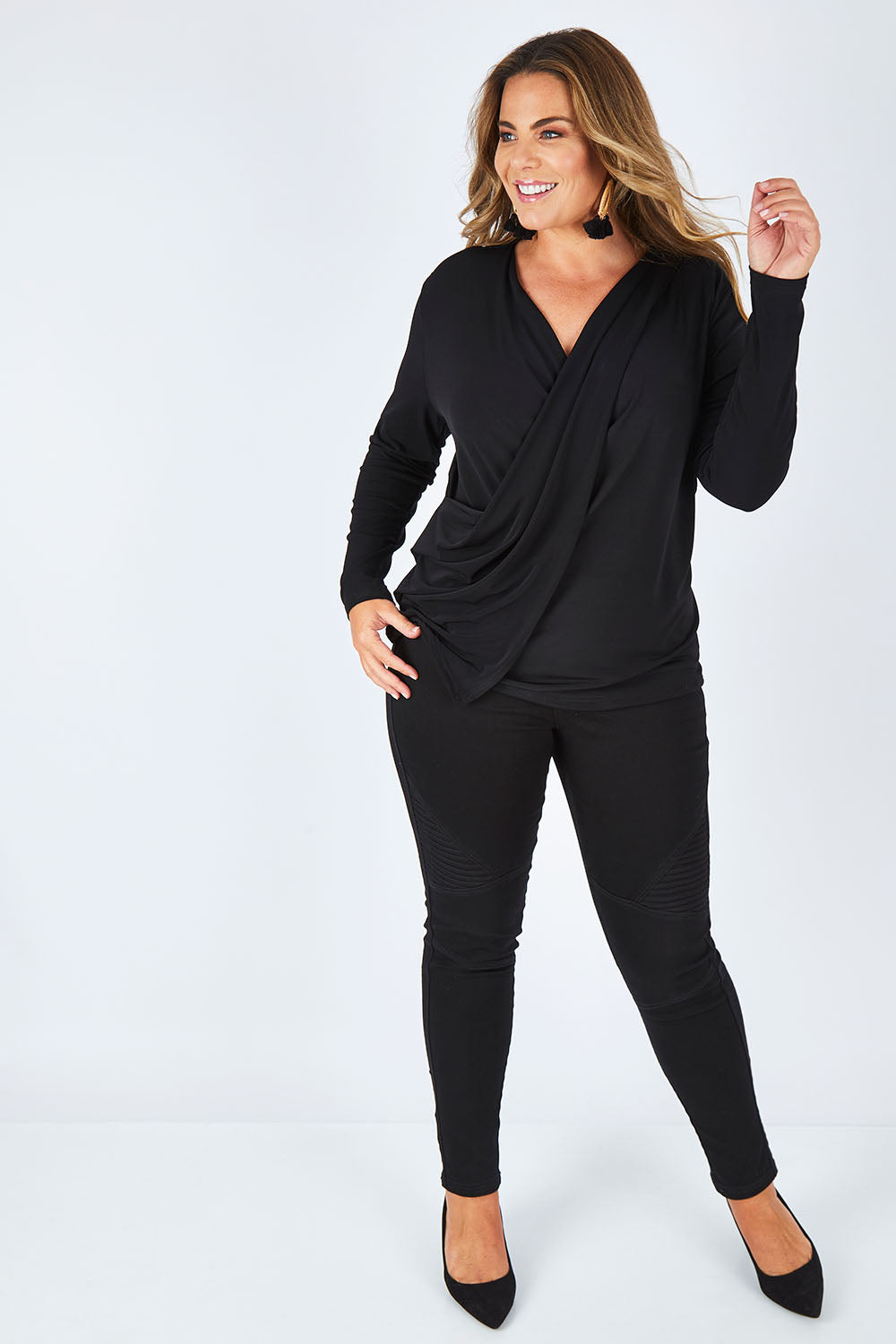 Model Fiona wearing size 16 of the Belle Drape Tee in colour Black (Black), from the front, showing the whole outfit