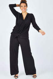 Model Laura wearing size 12 of the Belle Drape Tee in colour Black (Black), from the front, showing the whole outfit