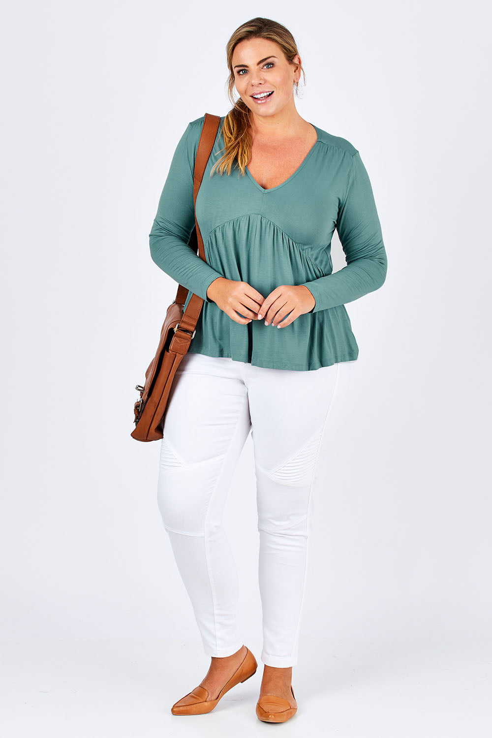 Model Fiona wearing size 16 of the Belle Ls Free Fall Tee in colour Greenland (Green), from the front, showing the whole outfit