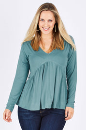 Model Jess wearing size 12 of the Belle Ls Free Fall Tee in colour Greenland (Green), from the front, cropped image