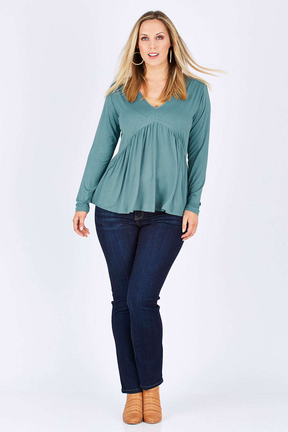 Model Jess wearing size 12 of the Belle Ls Free Fall Tee in colour Greenland (Green), from the front, showing the whole outfit