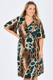 Model Jess wearing size 12 of the Belle Python Kimono Print Dress in colour Pythprt (Black), from the front, cropped image