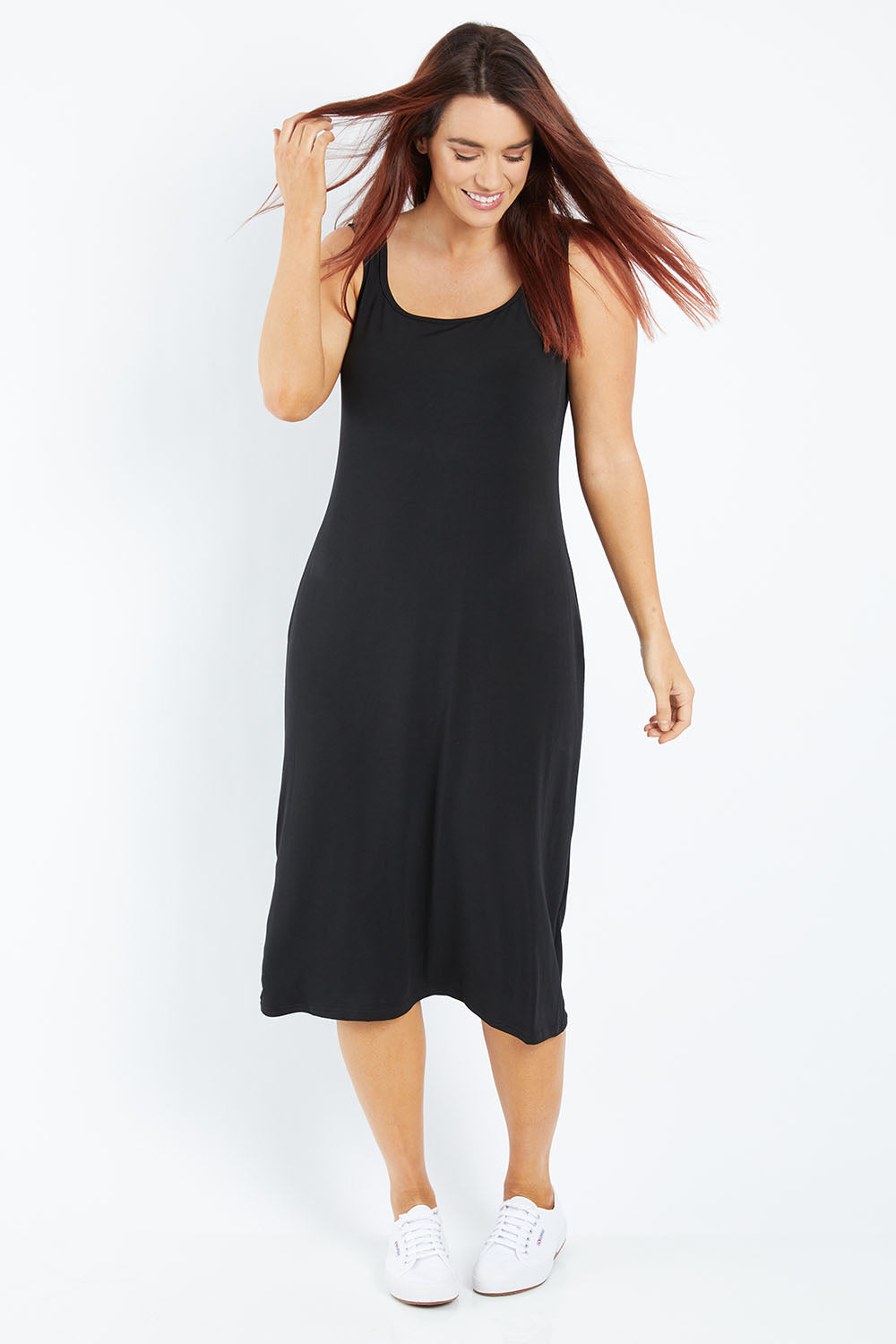 Model Laura wearing size 12 of the Belle Basic Slip Dress in colour Black (Black), from the front, showing the whole outfit