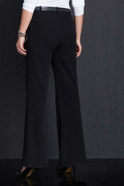 A model wearing size 12 of the Belle Suit Pants in colour Black (Black), from the back