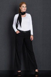 A model wearing size 12 of the Belle Suit Pants in colour Black (Black), from the front, showing the whole outfit