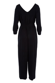 Product shot of the Belle 7/8 Sleeve Knit Jumpsuit With Self Belt in colour Black (Black), from the back