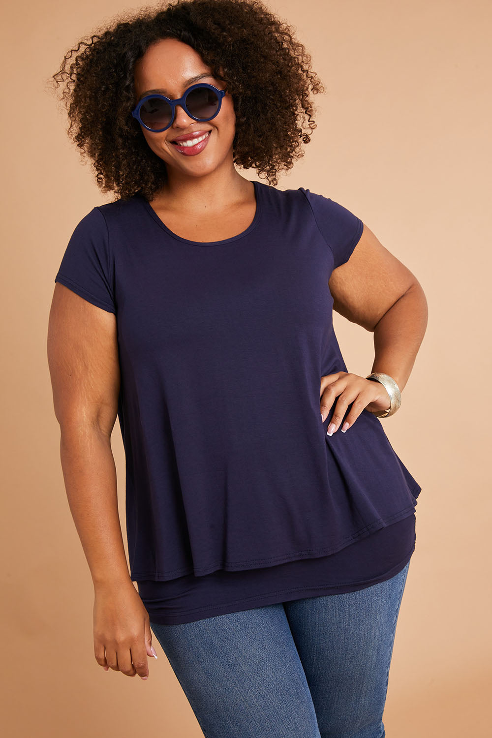 Model Alexis wearing size 16 of the Belle New Cap Sleeve Forgiver Tee in colour Navy (Blue), from the front, showing the whole outfit
