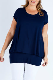 Model Fiona wearing size 16 of the Belle New Cap Sleeve Forgiver Tee in colour Navy (Blue), from the front, cropped image