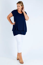Model Fiona wearing size 16 of the Belle New Cap Sleeve Forgiver Tee in colour Navy (Blue), from the front, showing the whole outfit