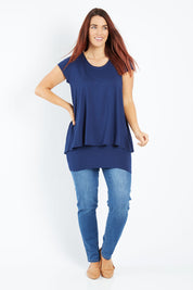 Model Laura wearing size 12 of the Belle New Cap Sleeve Forgiver Tee in colour Navy (Blue), from the front, showing the whole outfit