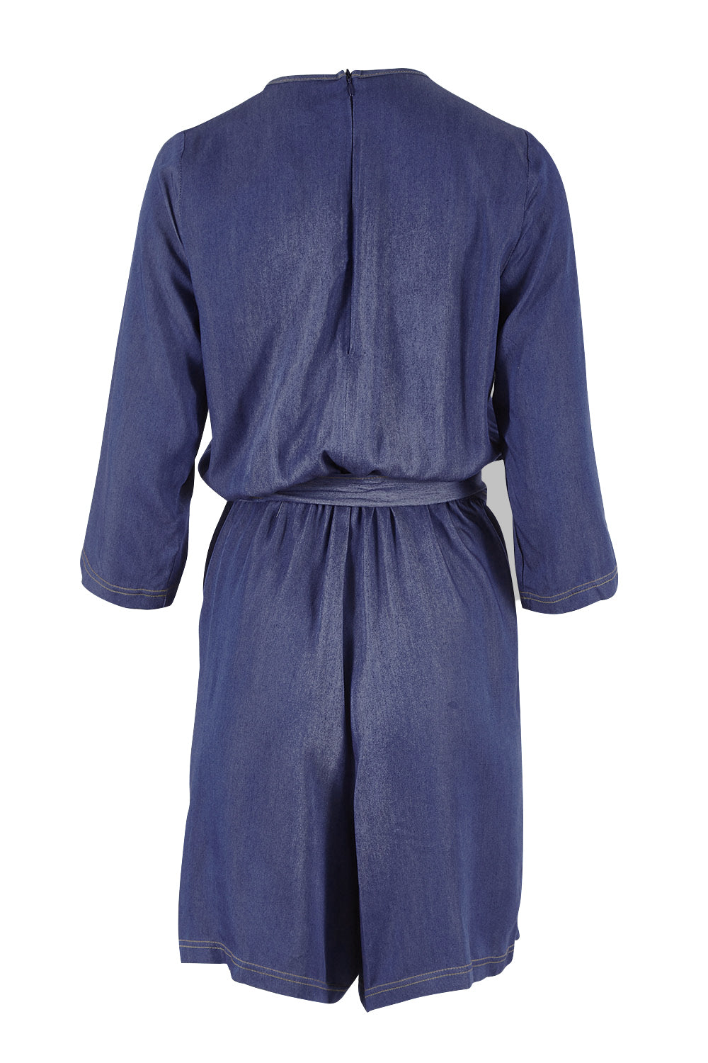 Product shot of the Belle Tencel Playsuit in colour Denim (Blue), from the back
