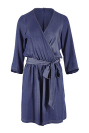 Product shot of the Belle Tencel Playsuit in colour Denim (Blue), from the front