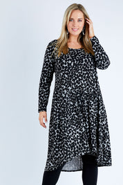 Model Jess wearing size 12 of the Belle Wooly Knit Dress in colour Greydot (Grey), from the front, cropped image
