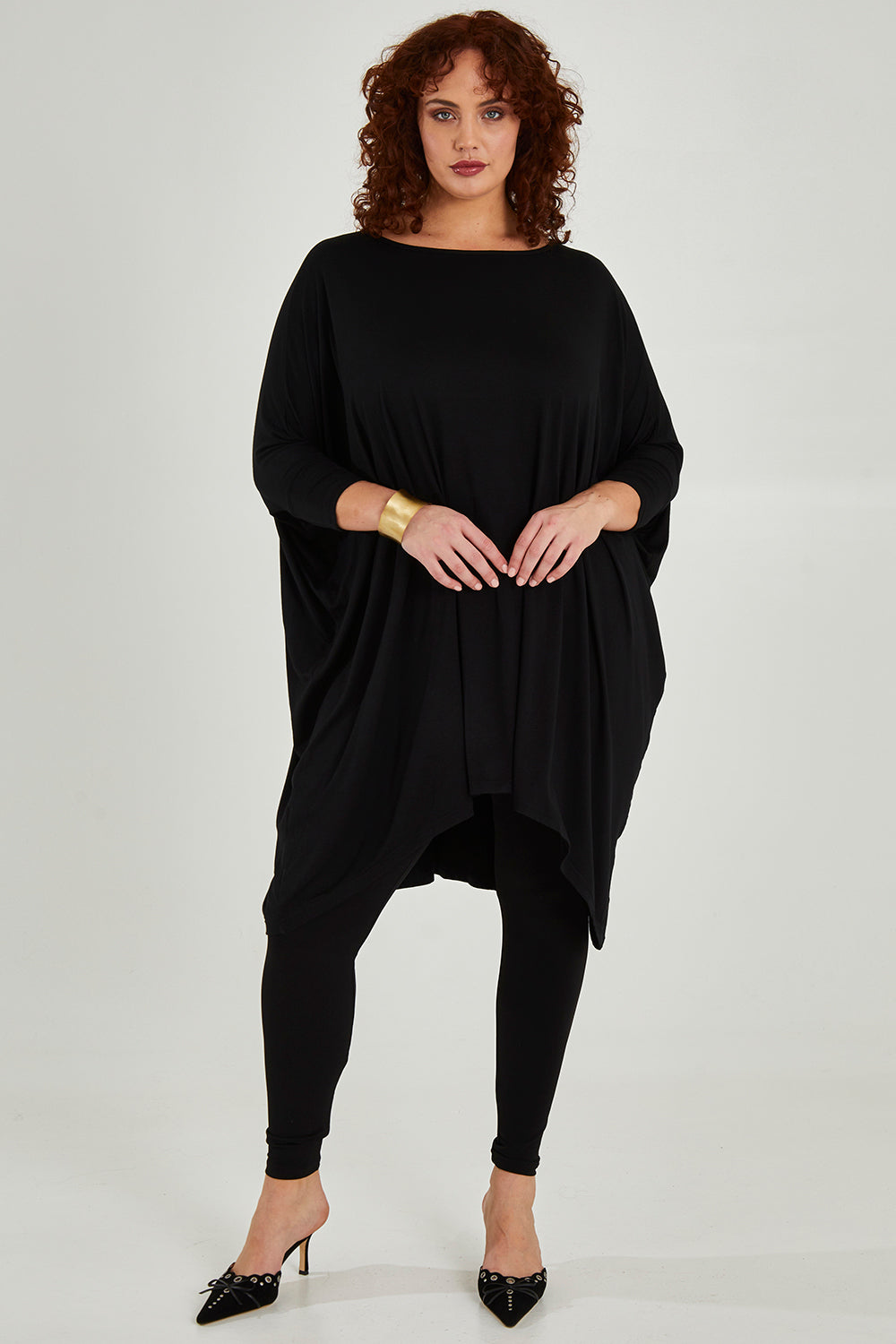 Model Maddy wearing size 16 of the Belle Legging in colour Black (Black), from the front, showing the whole outfit