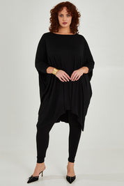 Model Maddy wearing size 16 of the Belle Legging in colour Black (Black), from the front, showing the whole outfit