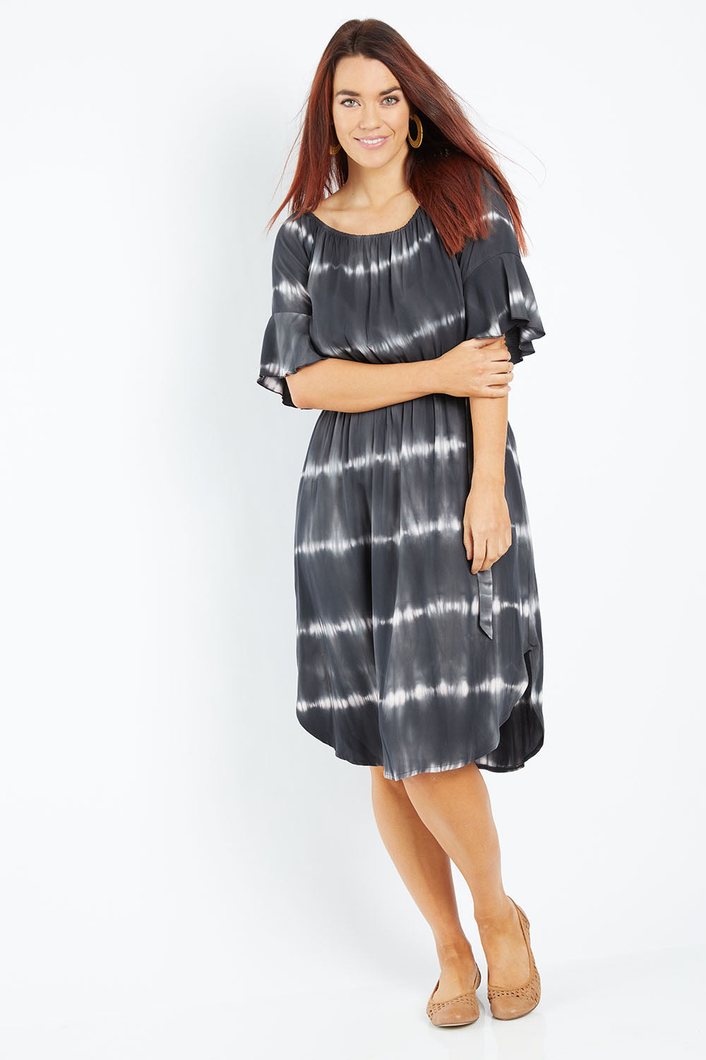 Model Laura wearing size 12 of the Belle Tie Dye Dress in colour Charcoal (Grey), from the front, showing the whole outfit
