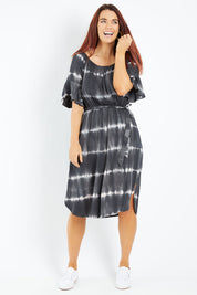 Model Laura wearing size 12 of the Belle Tie Dye Dress in colour Charcoal (Grey), from the front, showing the whole outfit