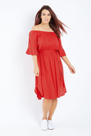Model Laura wearing size 12 of the Belle Waist Tie Dress in colour Red (Red), from the front, showing the whole outfit