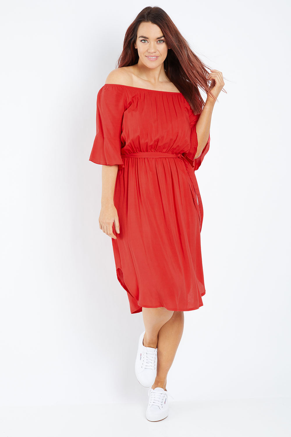 Model Laura wearing size 12 of the Belle Waist Tie Dress in colour Red (Red), from the front, showing the whole outfit