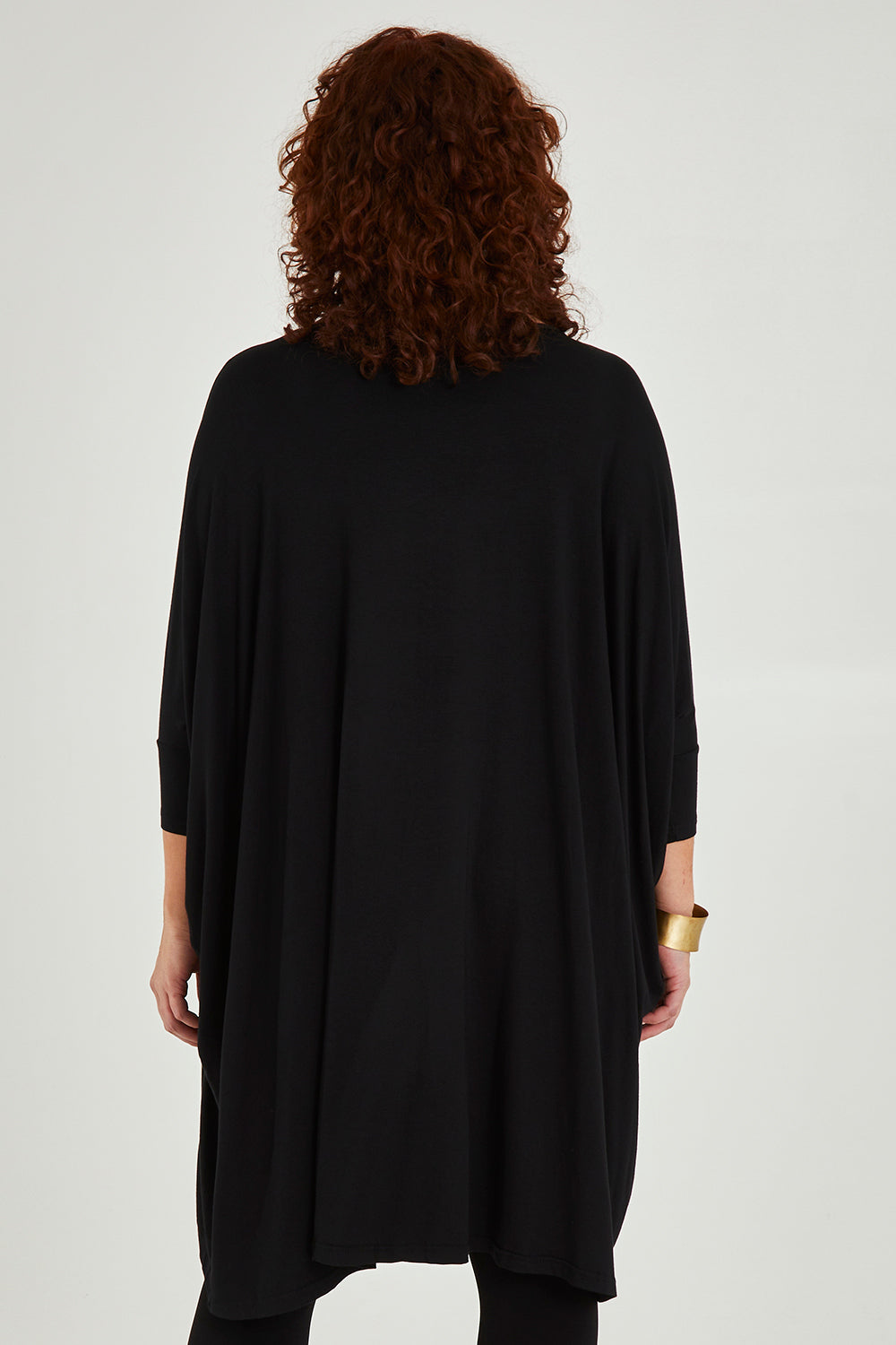 Model Maddy wearing size L of the Belle Essential Throw Over in colour Black (Black), from the back