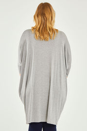 Model Caitlin wearing size L of the Belle Essential Throw Over in colour Greymarle (Grey), from the back