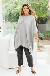 Model Palatina wearing size L of the Belle Essential Throw Over in colour Greymarle (Grey), from the front, showing the whole outfit