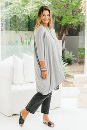 Model Palatina wearing size L of the Belle Essential Throw Over in colour Greymarle (Grey), from the front, showing the whole outfit
