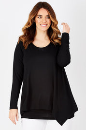 Model Laura wearing size 12 of the Belle Forgiver Tunic in colour Black (Black), from the front, cropped image
