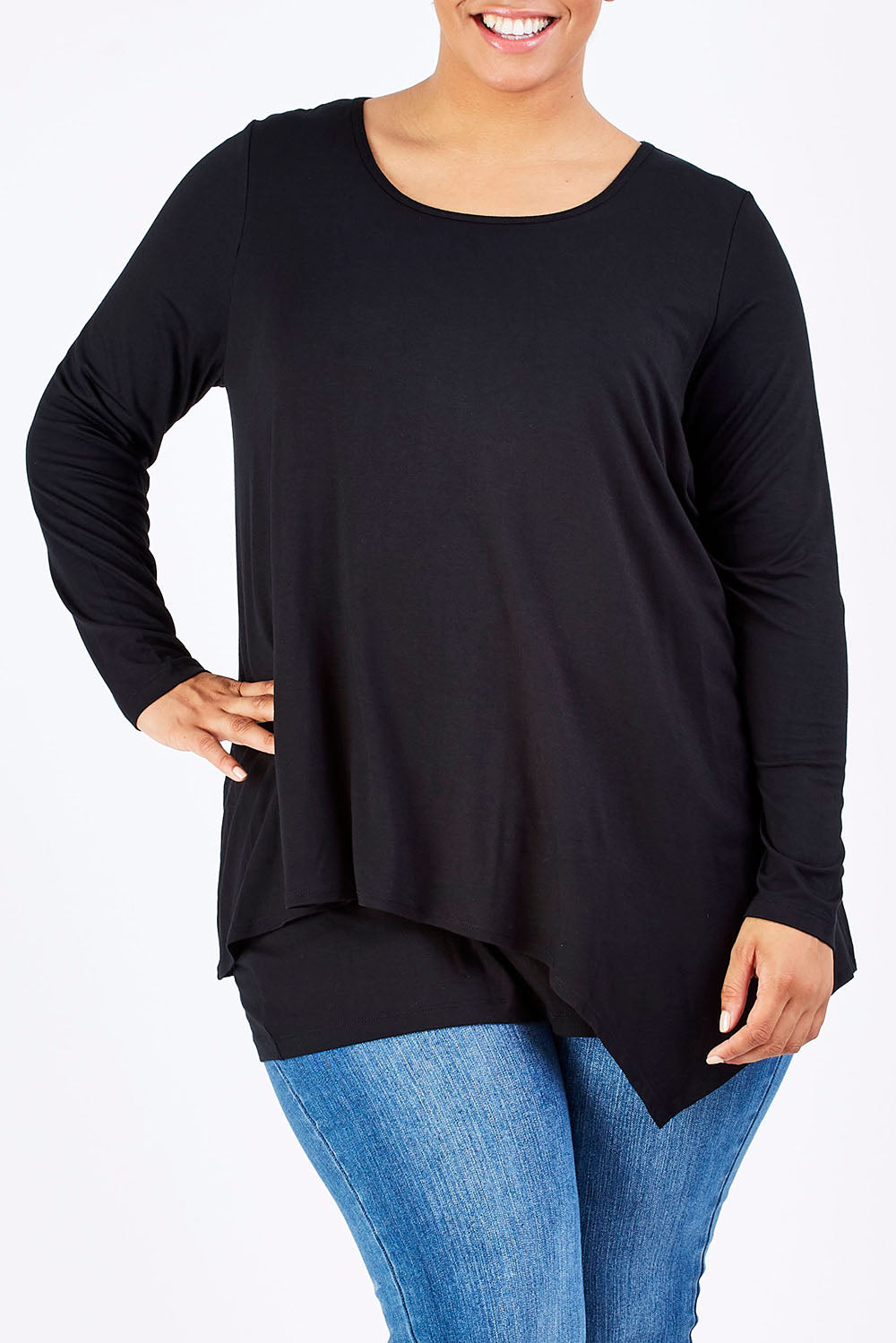 Model Shareefa wearing size 18 of the Belle Forgiver Tunic in colour Black (Black), from the front, cropped image