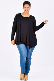 Model Shareefa wearing size 18 of the Belle Forgiver Tunic in colour Black (Black), from the front, showing the whole outfit