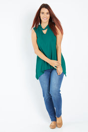 Model Laura wearing size 12 of the Belle Cowl Neck Sleeveless Top in colour Green (Green), from the front, showing the whole outfit