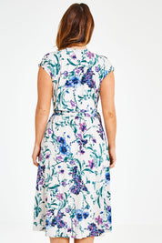 Model Laura wearing size 12 of the Belle Lavender Floral Wrap Dress in colour Lavender (Purple), from the back