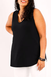 Model Sasha-Lee wearing size 16 of the Belle Essential V Neck Cami in colour Black (Black), from the front, cropped image