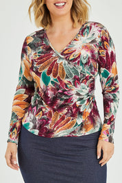 Model Jess wearing size 12 of the Belle Feathers Top in colour Feathers (Green), from the front, cropped image