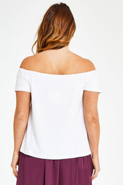 Model Laura wearing size 12 of the Belle Rib Off The Shoulder Tee in colour White (White), from the back