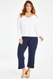 Model Laura wearing size 12 of the Belle Glitter Strap Top in colour White (White), from the front, showing the whole outfit