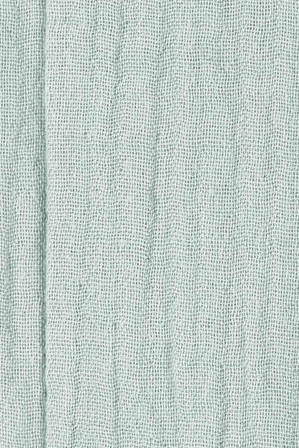 Product shot of the Belle Angled Hem Dress in colour Sage (Green), detail