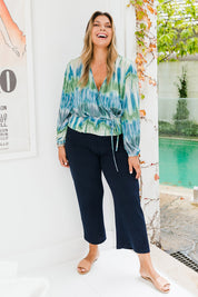 Model Palatina wearing size 16 of the Belle Fashion Knit Pant in colour Navy (Blue), from the front, showing the whole outfit