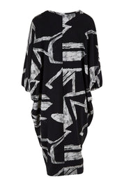 Product shot of the Belle Abstract Warm Knit Dress in colour Abstract (Black), from the back
