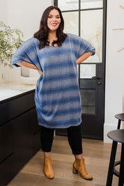 Model Lauren wearing size 16 of the Belle Side Drape Stripe Dress in colour Stripe (Blue), from the front, showing the whole outfit