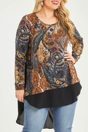 Model Katie wearing size 16 of the Belle Paisley Mixed Fabric Tunic in colour Paisley, from the front, cropped image