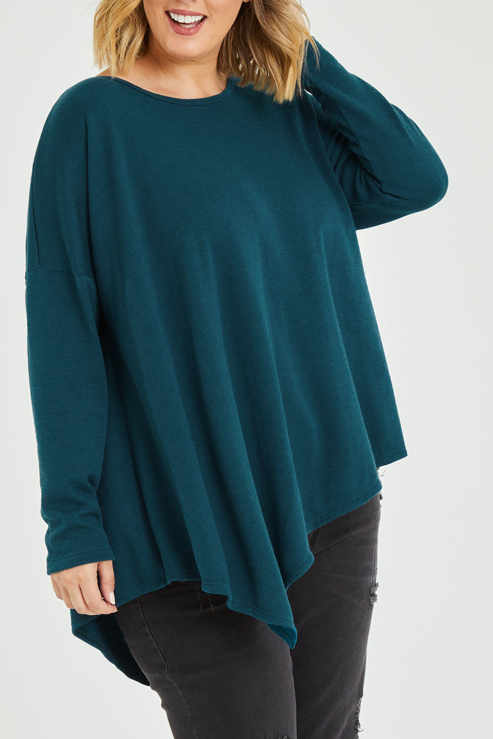 Model Jess wearing size 12 of the Belle Winter Warm Knit Throw Over in colour Teal (Blue), from the front, cropped image