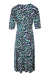 Product shot of the Belle X Over Full Skirt Dress in colour Bluegreen (Blue), from the back