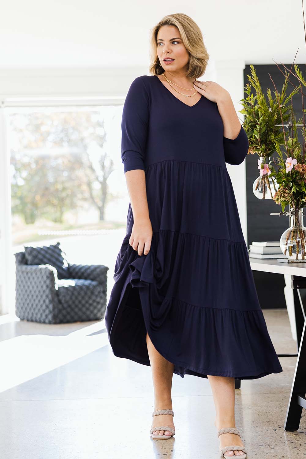 Model Fiona wearing size 16 of the Belle Tiered Jersey Maxi Dress in colour Navy (Blue), from the front, showing the whole outfit